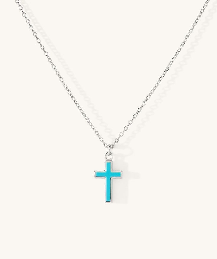 Details Made in 925 sterling silver or 18k gold vermeil. Gold Vermeil - a thick 18k gold layer on sterling silver. This results in a finish that outshines standard gold plating fivefold. SURFSURF jewelry is not only bold and durable but also hypoallergenic. Stone type: genuine turquoise Cross dimensions: 9 mm x 15 mm Chain length: adjustable 16", 18", 20" Chain width: 1.2 mm Riding Hairstyles, Jesus Jewelry, Jewelry Goals, Turquoise Cross Necklace, Western Necklaces, Western Clothing, Sterling Silver Cross Necklace, Turquoise Cross, Jewelry Essentials