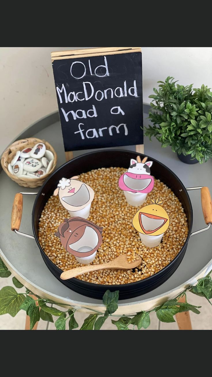 an old mcdonald's had a farm themed dessert in a pan on a table