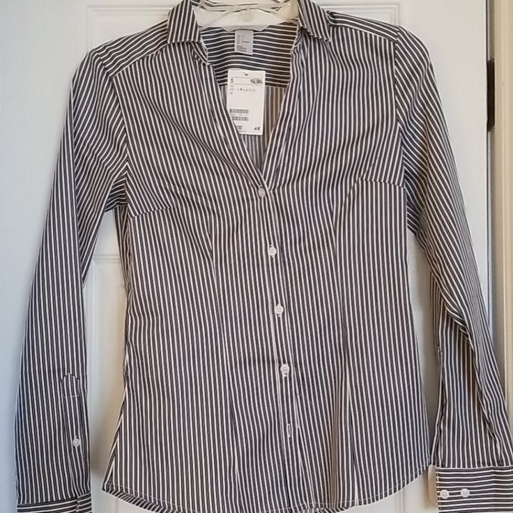 Nwt Navy Oil Stripe Button Down Blouse Stretchy .Material Button-up Shirt For Office Wear, H&m Button-up Blouse With Button Closure, Chic Button-up Shirt By H&m, Chic H&m Button-up Shirt, Formal Striped Tops With Button Closure, Chic H&m Shirt With Button Closure, Classic Button-up Blouse By H&m, Classic Button-up Tops By H&m, Classic Button-up Tops From H&m