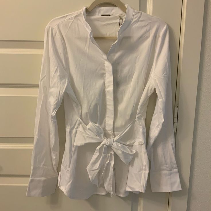 Nwt! Elie Tahari White Button Down Shirt With Cute Bow Size M 95% Cotton 5% Elastane Dry Clean Only White Tops With Button Cuffs For Day Out, Spring White Blouse With Placket, Chic White Shirt With Buttons, Chic Daywear Shirt With Button Closure, Chic Daywear Shirt With Buttons, White Button-up Blouse For Office, White Buttoned Shirt For Day Out, White Blouse With Placket For Work, White Button Shirt For Day Out