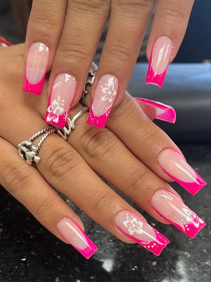 2023 Nail Art #nailsnailsnails #nailtech #nailart #naildesigns #frenchnails #pinknails #SAtxnailtech #nailtech Cute Summer Nails Long Square, Pink Nails With Hawaiian Flower, Hot Pink Nails With Design Summer French Tips, Hibiscus Flower Nails 2000s, Hot Pink French Tips With Flowers, Summer Nail Inspo Hibiscus Flower, Hibiscus Flower Nail Designs, Hawaiian Flower Nails Acrylic French Tip, Long Summer Nails 2024