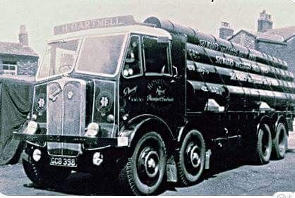 an old black and white photo of a truck