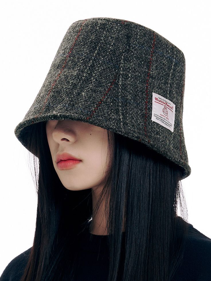 Editor's NotesLUOESPAC presents street-style accessories that add a unique and stylish accent to your appearance. - Bucket hat style- Made of pure wool from Harris Tweed- Plaid pattern- Bar-tack design- Harris tweed patch on the side- Casual and stylish mood Measurements (in.)One Size- Circumference: 24.02in.- Crown: 6.69 in. Composition & Care- Material: 100% Wool- Please refer to the care label Designer- by LUOESPAC Casual Wool Cloche Hat With Short Brim, Trendy Wool Hat For Winter, Trendy Wool Winter Hat, Casual Flat Cap Felt Hat For Winter, Trendy Winter Wool Hat, Casual Felt Bucket Hat For Fall, Casual Wool Flat Cap Felt Hat, Casual Wool Bucket Hat For Winter, Wool Bucket Hat With Curved Brim For Fall