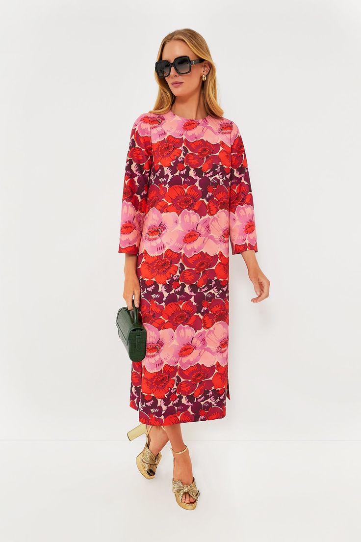 Bright and bold, the Poppy Stripe Hutton Dress is one of our favorite styles for bringing a pop of color to any occasion. Adorned with fabulous florals that bring a certain wow-factor, and finished with thoughtful details like chic three-quarter length sleeves and functional side slits at the hem, this relaxed midi is sure to have you looking and feeling amazing. Pair it with flats and gold hoops for brunch with your besties, or with statement heels and a clutch for a soiree! Round neckline Thre Vibrant Floral Print Dress For Garden Party, Vibrant Floral Dress For Garden Party, Vibrant Red Floral Print Maxi Dress, Vibrant Red Maxi Dress With Floral Print, Red Floral Print Midi Dress For Garden Party, Red Midi Floral Dress, Vibrant Red Floral Print Dress, Chic Red Floral Print Dress, Vibrant Pink Midi Dress With Floral Print