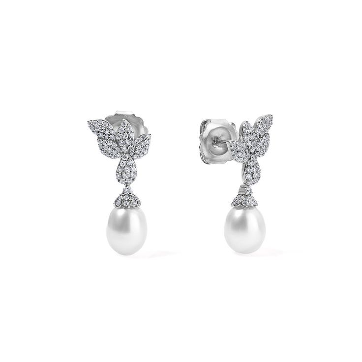 These Pave Petal and Pearl Drop Earrings beautifully blend the sparkle of pave-set diamonds with the luster of pearls. These earrings exude a sense of romance and femininity, making them a perfect choice for weddings, formal events, or any occasion where a touch of glamour is desired. Available in 14K White Gold Diamond weight = 0.98 carats Freshwater Pearl size = 9x7mm Timeless Diamond Pearl Earrings For Evening, Luxury Diamond Earrings With Pearl Drop, Diamond White Pearl Drop Earrings For Formal Events, White Pearl Earrings With Elegant Design For Formal Occasions, Exquisite Pearl Earrings For Evening With Elegant Design, Elegant White Gold Pearl Diamond Earrings, Classic Akoya Pearl Earrings For Evening, Exquisite Pearl Earrings For Formal Occasions, Fine Jewelry Cubic Zirconia Pearl Earrings For Wedding