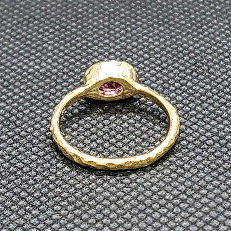 14k solid yellow gold stackable hammered ring with 1.10 ct. 7x5 mm oval shape natural AAA pink tourmaline, this item can also be ordered in white or rose gold in different color gemstones such as, amethyst, pink amethyst, green amethyst, Swiss blue topaz, London blue topaz, white topaz, citrine, garnet, smoky quartz, aquamarine, morganite, peridot, green tourmaline, emerald, ruby, sapphire & tanzanite, please contact me for a quote as each gemstone varies in price. I am a manufacturer of fin Hammered Ring, Peridot Green, Hammered Rings, Ruby Sapphire, Pink Amethyst, Swiss Blue Topaz, Green Amethyst, London Blue Topaz, Green Tourmaline