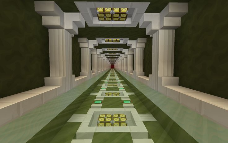 an image of a long hallway that is in minecraft with columns and green grass