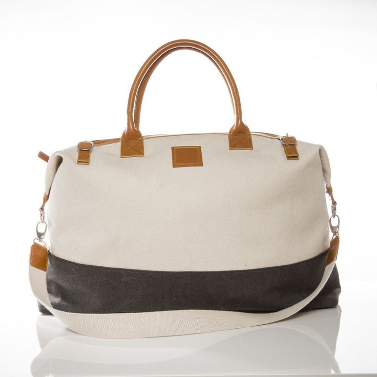 The perfect weekender bag for any adventure. Large enough to fit several outfits and small enough to throw in your passenger seat, this cream cotton bag features a long removable strap, leather accents, and satin lining. (#2208) •Dimensions: 22"L x 10"W x 13"H Best Weekender Bag For Women, Best Travel Tote, Canvas Duffel Bag, Faux Leather Bag, Travel Tote Bag, Weekend Bag, Duffel Bag Travel, Leather Accents, Travel Tote