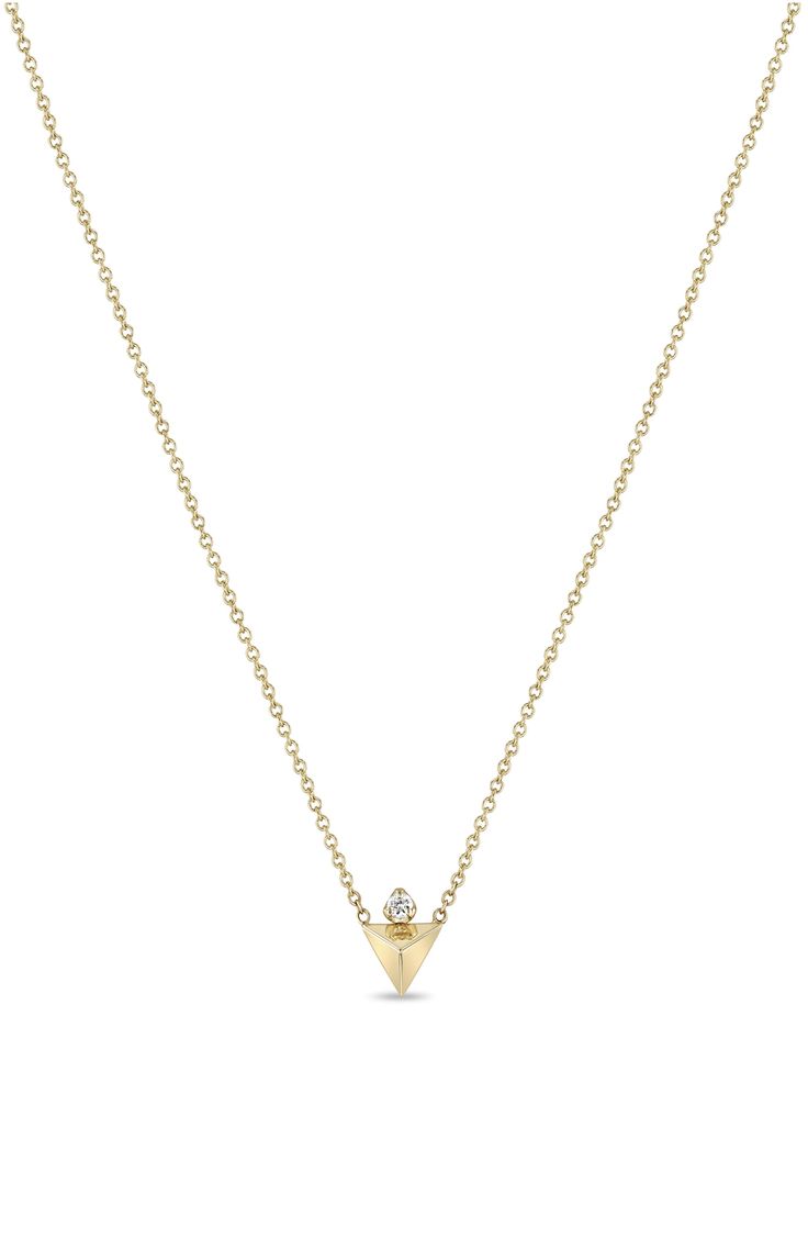 A dainty diamond rises over the glossy pyramid pendant anchoring this delicate 14-karat-gold chain necklace. 14" length; 2" extender; 1/4" square pendant Total diamond weight: 0.03ct. Color: F–G Clarity: SI2 14k gold/diamond Made in the USA >Diamond Guide 14k Yellow Gold Charm Necklace With Diamond, Minimalist Yellow Gold Charm Necklaces With Diamond Accents, 14k Yellow Gold Charm Necklace With Single Diamond, Dainty 14k Gold Diamond Necklace, Tarnish Resistant, Gold Diamond Triangle Jewelry, 14k Gold Diamond-shaped Necklace For Gift, Elegant Gold Triangle Necklace, 14k Gold Diamond-cut Cross Pendant, Zoe Chicco