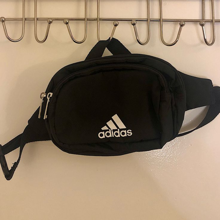 Can Be Worn Cross Body Or Around The Waist New And Never Used, But Without Tags Casual Black Bag For School, Casual Black School Bag, Sporty Black Crossbody Shoulder Bag, Trendy Adidas Black Bag, Trendy Black Adidas Bag, Casual Adidas Shoulder Bag For Travel, Black Pouch School Bag, Functional Black Adidas Bag, Functional Adidas Black Bag