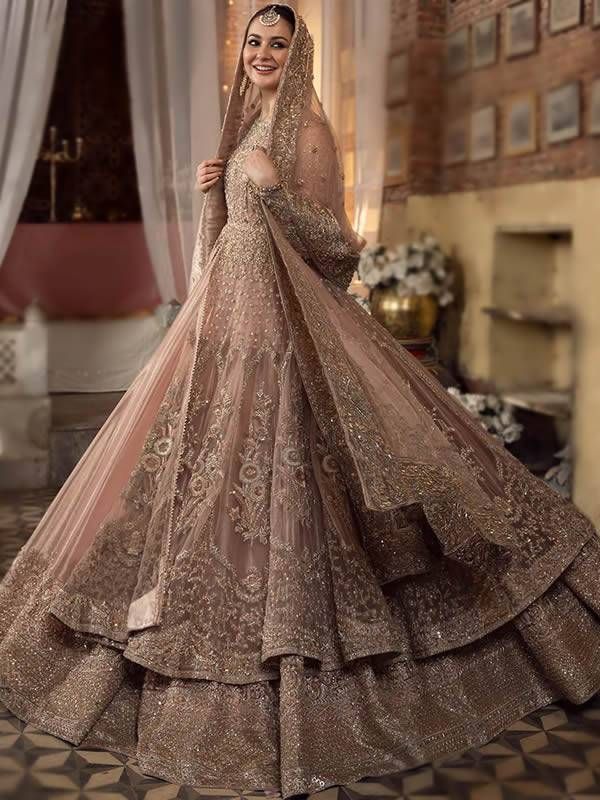 Gold Gown With Intricate Embroidery And Long Sleeves, Festive Long Sleeve Gown With Intricate Embroidery, Reception Gown With Intricate Embroidery And Long Sleeves, Long Sleeve Gown With Intricate Embroidery For Reception, Embellished Semi-stitched Long Sleeve Gown, Intricately Embroidered Long Sleeve Gown For Reception, Reception Gown With Dupatta And Long Sleeves, Designer Long Sleeve Gown With Dupatta, Long Sleeve Gown With Dupatta For Reception