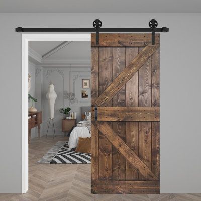 an open barn door in the middle of a room