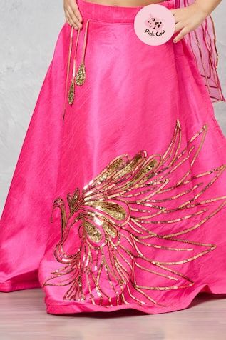 Pink lehenga with hand embroidery and latkans. Paired with an embroidered blouse and dupatta. - Aza Fashions Party Wear Embroidered Lehenga In Raw Silk, Party Wear Embroidered Gown For Navratri, Embroidered Party Wear Gown For Navratri, Embroidered Party Gown For Navratri, Embroidered Party Wear Lehenga For Festivals, Party Wear Dresses With Dori Work For Festivals, Pink Art Silk Dress With Gota Work, Raw Silk Party Wear Dresses For Festivals, Art Silk Embellished Dresses For Festivals