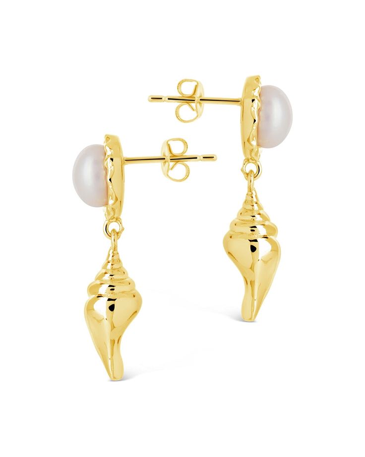 Elevate your style with our Beverly Drops Studs. These exquisite drop earrings feature a delicate combination of shells and pearls, creating a luxurious accessory that will effortlessly elevate any outfit. Make a statement of elegance and sophistication with the Beverly Drops Studs. Material: 14K gold or rhodium plated brass, freshwater pearls Features: 1.2" drop, 0.45" stud, 0.75" charm, 8mm pearls, Lead & Nickel free, post back Shells And Pearls, Solid Gold Bracelet, Solid Gold Earrings, Statement Drop Earrings, Men Earrings, Free Post, Mens Accessories Jewelry, Pearl Shell, Earring Sale