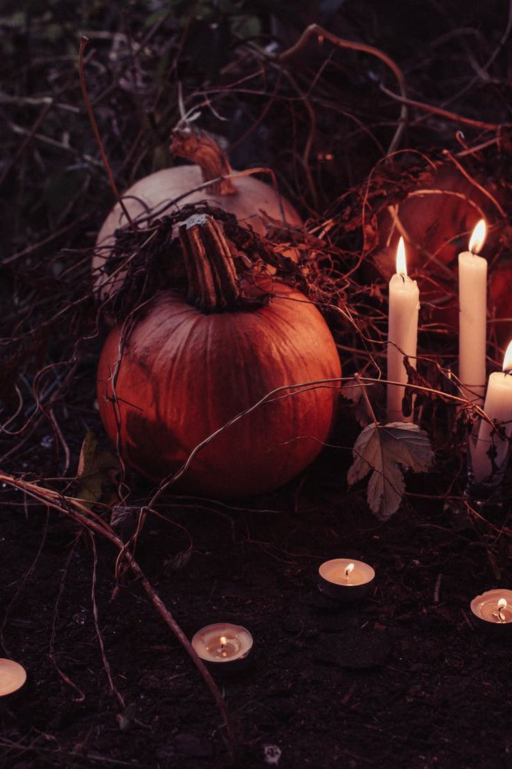 pumpkins and candles with the words samhan blessing