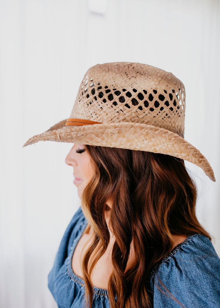 As a product made from 100% straw raffia, the Karter Cowboy Hat offers natural, breathable material for comfortable wear. With an elastic sweatband and leather chin cord, this one-size-fits-most hat stays secure and in place. The tea stains add a touch of rustic charm to this classic accessory. Brim: 3.5" 100% Straw Tea Stains, Curvy Dress, Cowboy Hat, The Tea, Rustic Charm, Cowboy Hats, Straw, Cowboy, Short Dresses