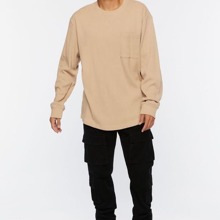 A Waffle Knit Tee Featuring A Crew Neck, V-Notch Stitch, Chest Patch Pocket, Dropped Shoulders, Long Sleeves With Banded Cuffs, And A Curved Dolphin Hem. Content + Care - 60% Cotton, 40% Polyester - Machine Wash Cold Long Sleeve Solid Knit Top For Layering, Solid Long Sleeve Knit Top For Layering, Beige Long Sleeve Top For Loungewear, Ribbed Long Sleeve T-shirt For Fall, Long Sleeve Waffle Knit Sweatshirt For Fall, Casual Long Sleeve Sweatshirt For Layering, Casual Ribbed Long Sleeve Tops, Casual Long Sleeve Ribbed Tops, Fall Waffle Knit Long Sleeve Sweatshirt