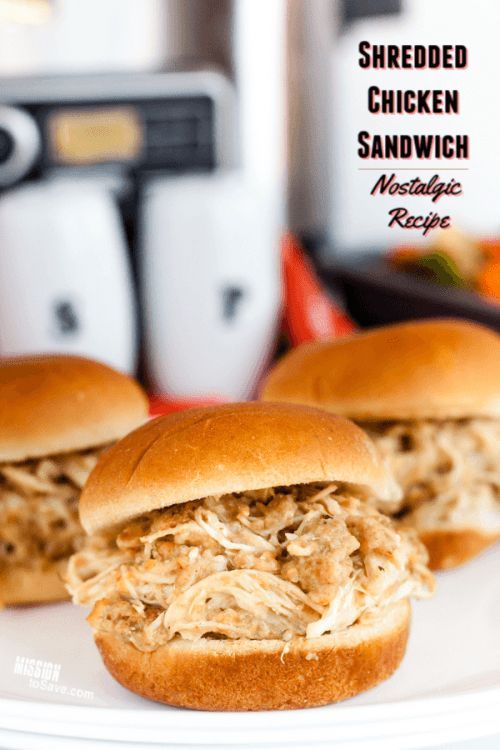 two shredded chicken sandwiches on a plate with the words shredded chicken sandwich in front of them