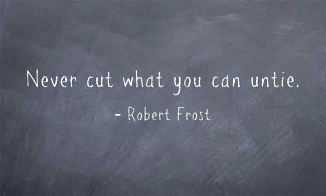 a blackboard with the quote never cut what you can write robert frost