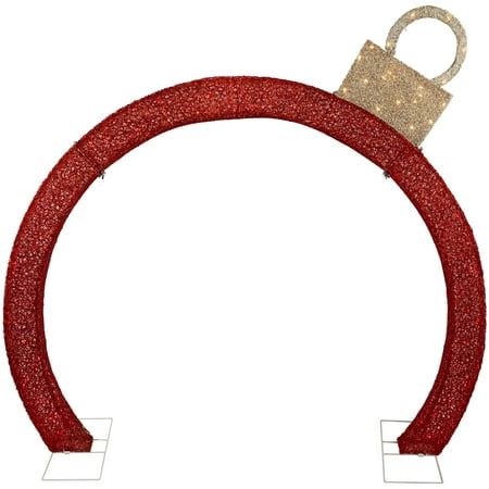 a red and gold christmas ornament with a lock on it's end