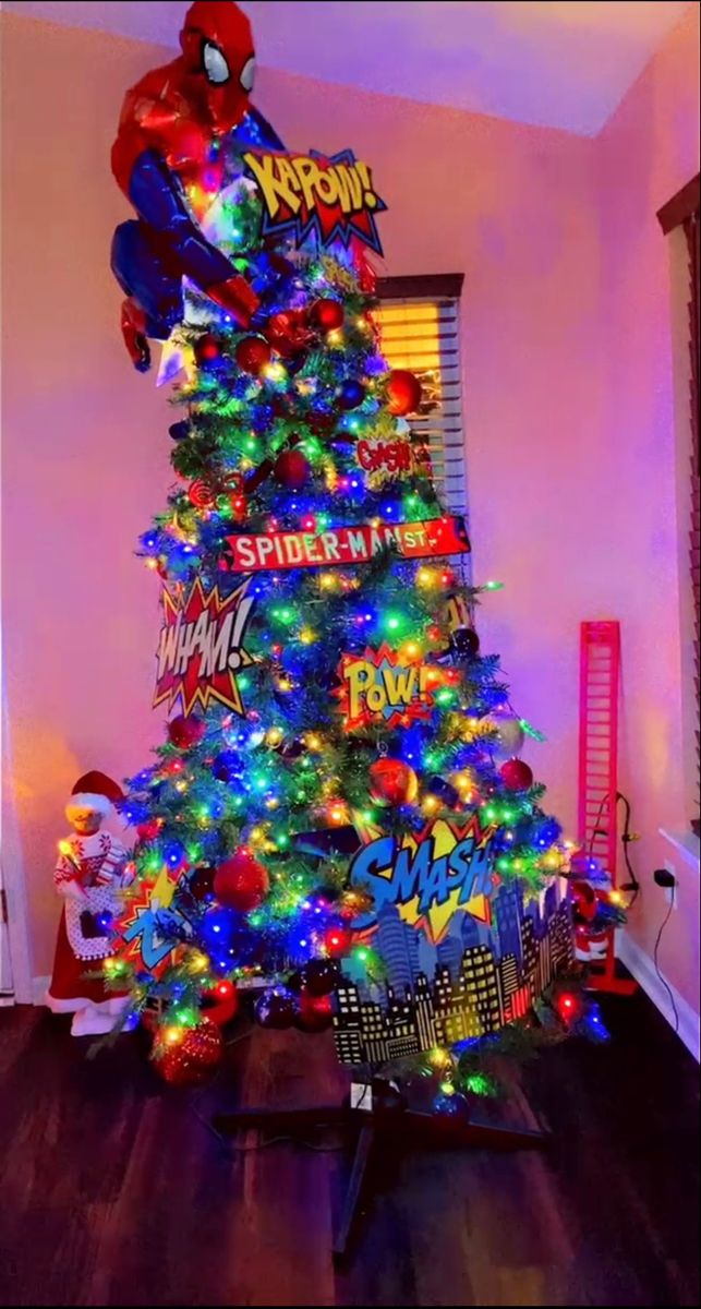 a spiderman christmas tree decorated with lights