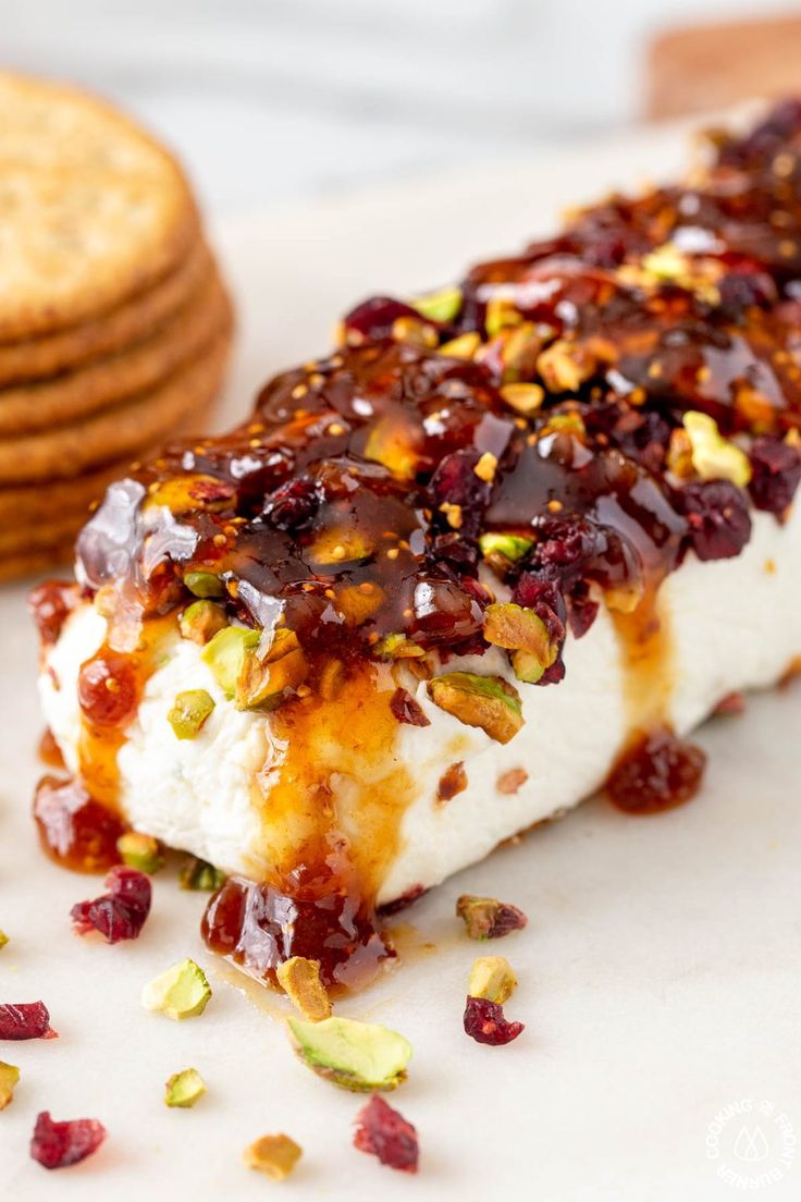 a close up of food on a plate with crackers