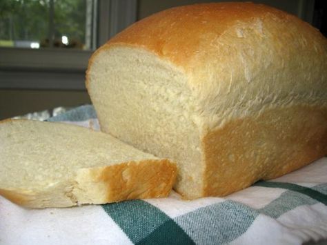 a loaf of bread sitting on top of a towel