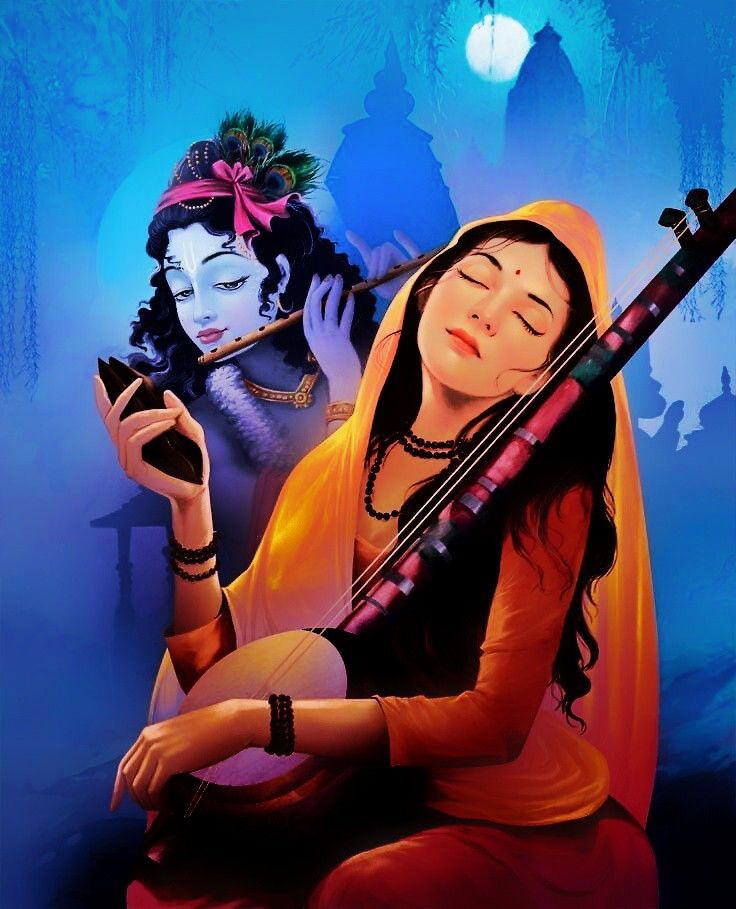 a woman sitting on the ground with her eyes closed while holding a musical instrument in front of her face