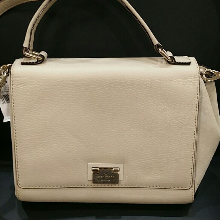 Kate Spade Shoulder Bag Called The Laurel Front Closure Leather Front And Back Of Purse Suede On The Sides 3 Inside Pockets One Zips Handle Or Removable Shoulder Strap 8 Inches Deep 12 Inches Wide Shoulder Strap Is 40 Inches Long And Extendable,Hardware Is Gold Color Is Called Ostrich Egg No Trades Elegant Cream Kate Spade Bag, Kate Spade White Bag With Top Carry Handle, White Kate Spade Bag With Top Carry Handle, Luxury Cream Kate Spade Bag, Kate Spade Cream Shoulder Bag With Removable Pouch, Kate Spade White Shoulder Bag With Top Carry Handle, Kate Spade Cream Crossbody Shoulder Bag, Kate Spade Cream Shoulder Bag For Shopping, Kate Spade Cream Rectangular Bag