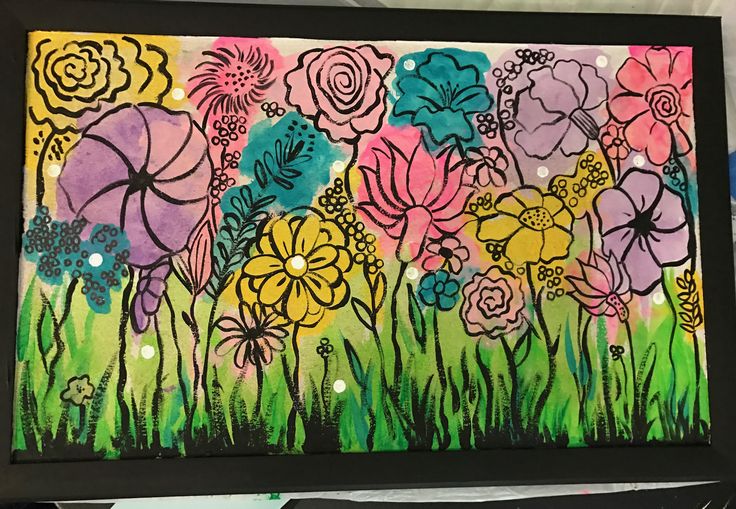 a painting with flowers painted on it