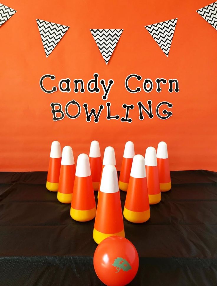 candy corn bowling game with orange cones