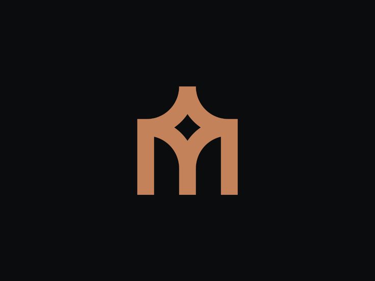 the letter m is made up of two intersecting shapes and has an orange color on it