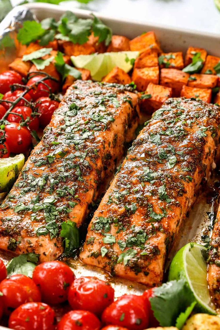 salmon and vegetables on a platter ready to be served