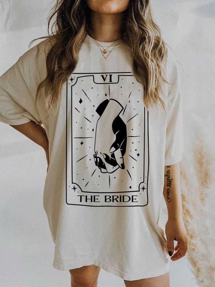 a woman wearing a t - shirt that says the bride