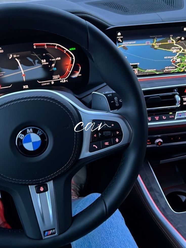 the interior of a car with dashboard, steering wheel and electronic display on the screen