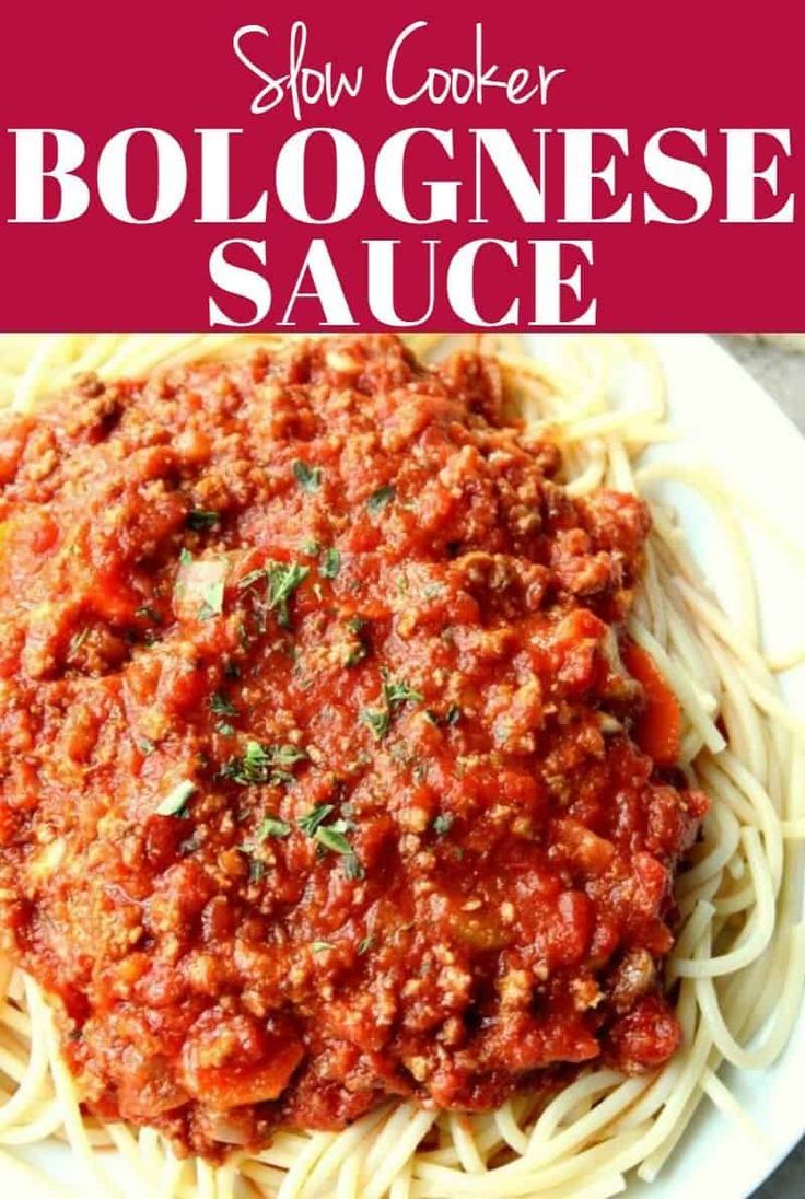 slow cooker bolognesee sauce on a white plate with text overlay