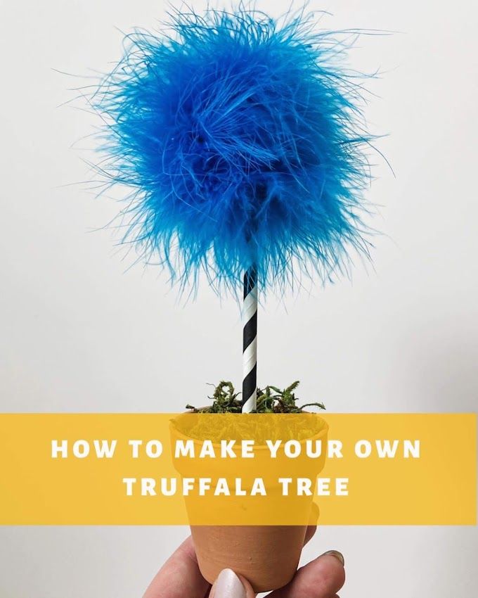 a hand holding a plant with blue feathers on it and the words how to make your own truffla tree