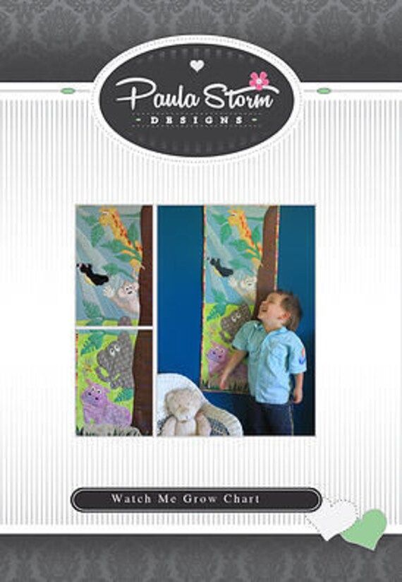 a child standing in front of a wall with pictures on it and the words, watch me grow chart