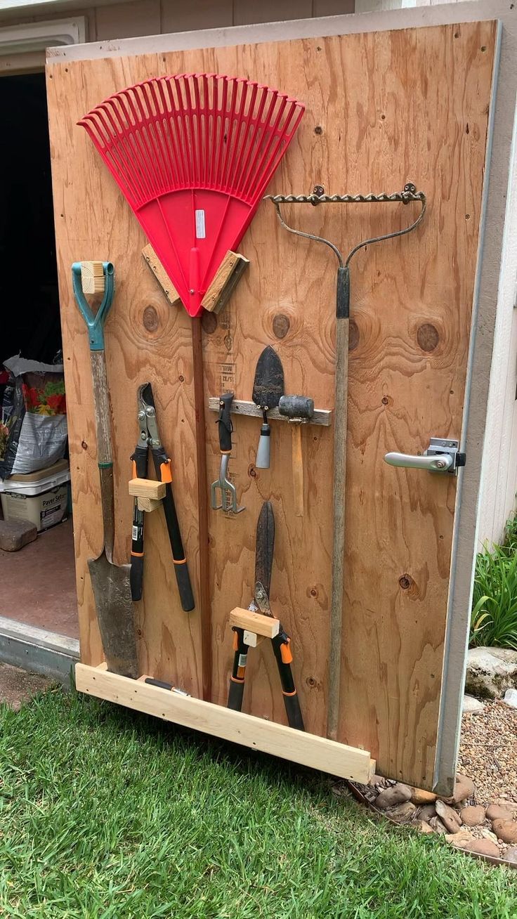 Looking for creative ways to organize your garden tools? Check out our top 10 ideas for garden tools organization! From DIY storage solutions to clever organization hacks, we've got you covered. Say goodbye to clutter and hello to a tidy garden shed with these innovative tips. Get inspired and start organizing your garden tools today! How To Build Tool Storage, Storage Shed Interiors, Outdoor Equipment Storage, Atv Storage Ideas, Tractor Storage Ideas, Lawn Chair Storage Garage, Organize Shed Ideas, Rake Storage, Shed Door Ideas