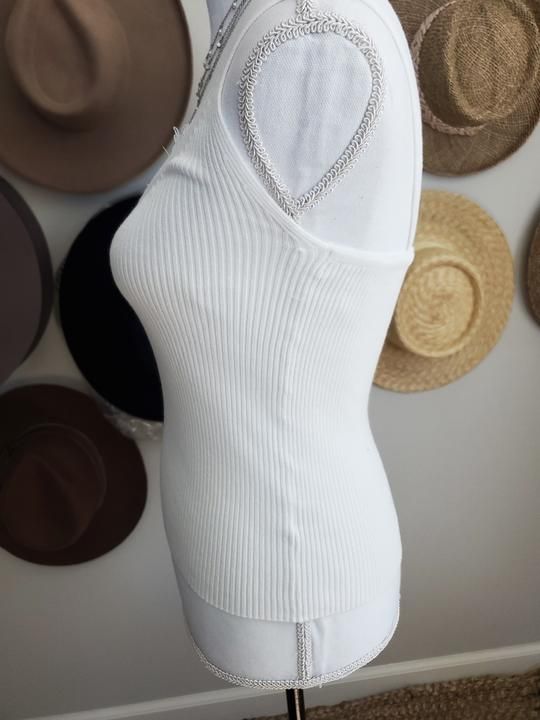 LACE TRIM KNIT CAMI – Mota Boutique Chic V-neck Pointelle Knit Tank Top, Chic White Tank Top With Ribbed Neckline, Stretch Pointelle Knit Tank Top For Layering, White Ribbed Knit Tank Top, Chic Ribbed Cami Top, Trendy Fitted Tops With Crochet Trim, Stretch Knit Cami Tank Top, Chic Ribbed Camisole Top, Elegant Pointelle Knit Tank Top For Summer