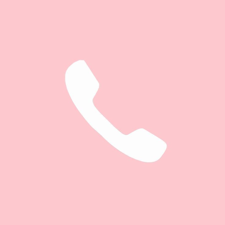 a white phone on a pink background