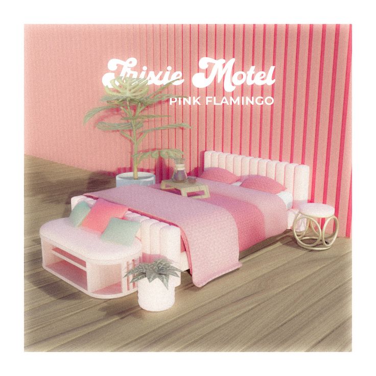 a pink bed sitting next to a potted plant on top of a wooden floor