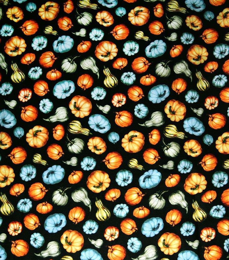 an orange and blue pattern on a black background