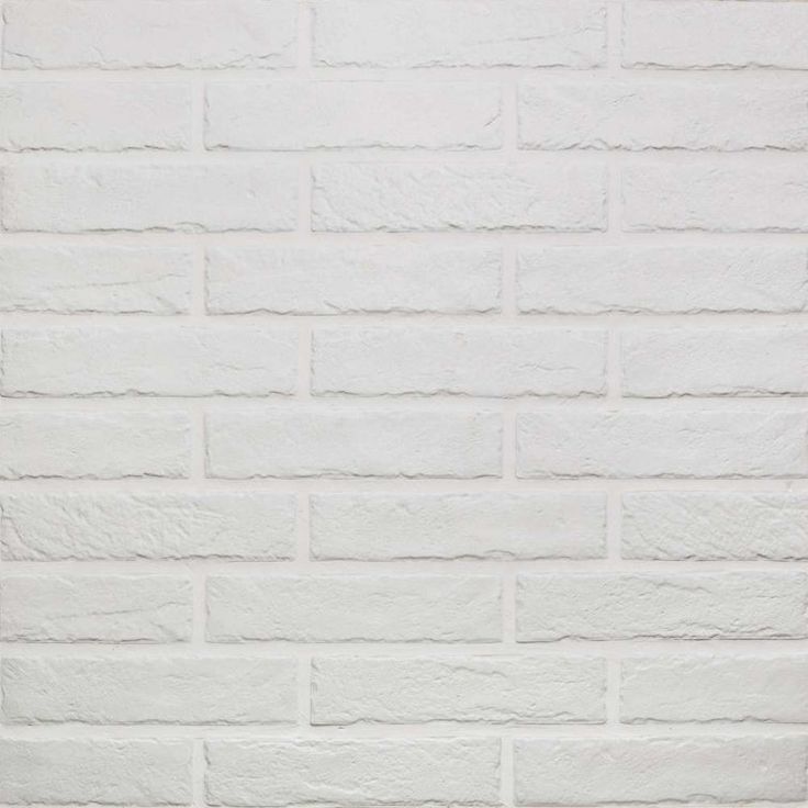 a white brick wall with no mortars or mortars on the bottom and sides