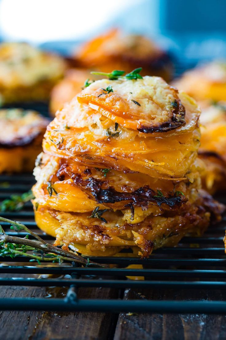 a stack of food sitting on top of a metal rack