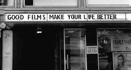 a black and white photo of a store front with the words good films make your life better written on it