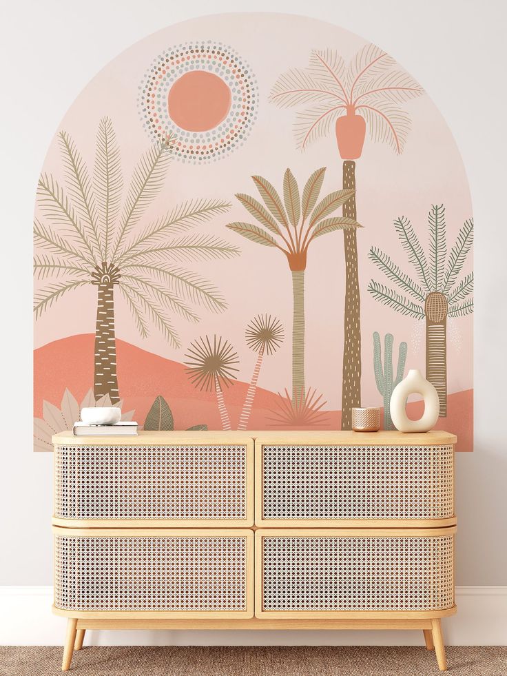 a wall mural with palm trees and plants on it in a room that has carpeted flooring