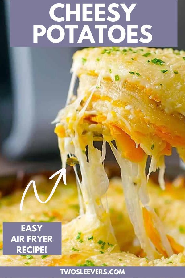 cheesy potatoes being lifted from a casserole dish with cheese on top