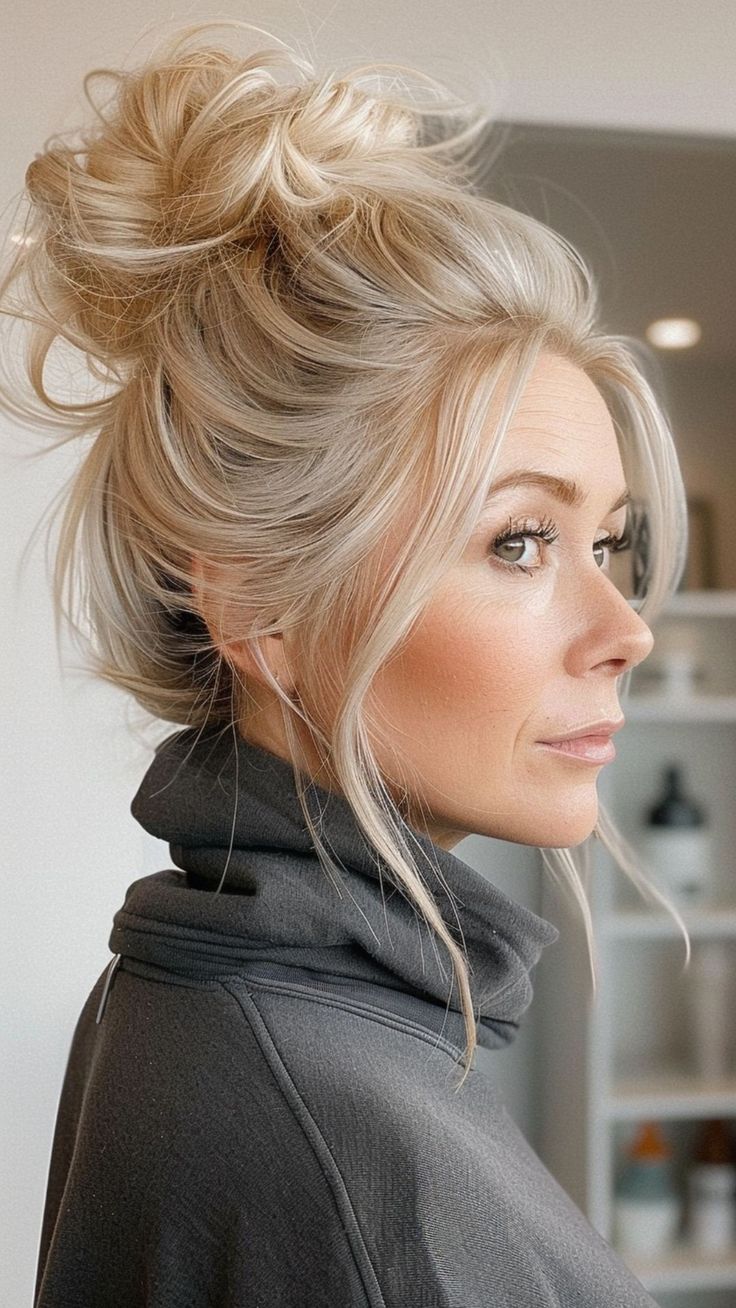 24 Hairstyles to Make Every Older Woman Feel Beautiful Blonde Hair Updo Casual, Boohoo Hairstyles, Over 40 Updo Hairstyles, Updos Blonde Hair, Messy Bun With Hair Extensions, Loose Ponytail Hairstyles Messy Pony, Up High Hairstyles, Diy Mother Of The Bride Hairstyles, Mom Braids Easy Hairstyles