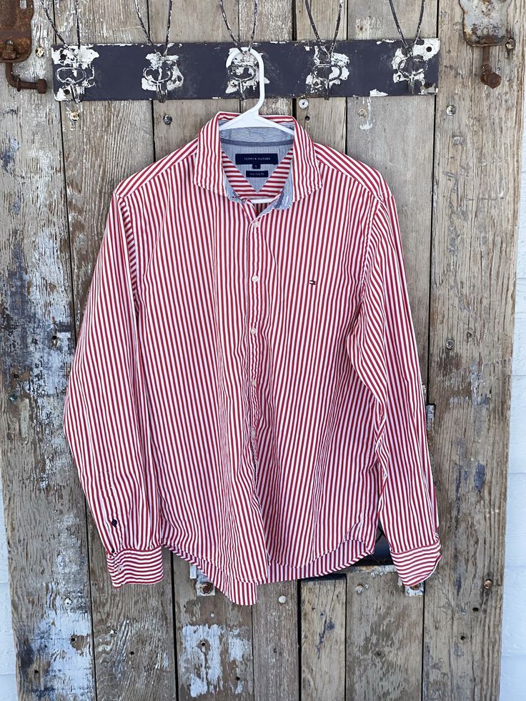 Vintage red and white button-up shirt. In great vintage condition. Light weight. Great striped pattern. Tommy Hilfiger brand. Size men's large. Red Shirt With Striped Collar For Spring, Red And White Striped Shirt Outfit, Tommy Hilfiger Casual Shirt With Buttons, Red White Striped Shirt, Red Polo Shirt With Striped Collar, Tommy Hilfiger Shirts Men, Red And White Stripped Shirt, Red Cotton Shirt With Vertical Stripes, Tommy Hilfiger Red Cotton Shirt